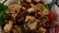 Hot cherry pepper chicken over salad Hot cherry pepper chicken over salad