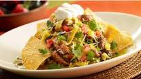The Cheesecake Factory's Green Chilaquiles With Carnitas and Eggs The Cheesecake Factory's Green Chilaquiles With Carnitas and Eggs