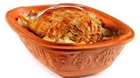 Pork roll roast in a roman pot Pork roll roast in a roman pot