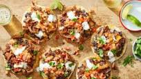 Carnitas Tostadas with Refried Black Beans, Pico de Gallo & Lime Crema Carnitas Tostadas with Refried Black Beans, Pico de Gallo & Lime Crema