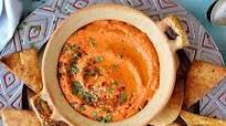 Roasted Red Pepper And Chilli Hummus With Home-Made Pitta Chips Roasted Red Pepper And Chilli Hummus With Home-Made Pitta Chips
