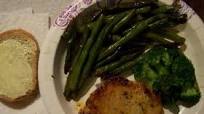 Diabetic or Healthy Eating ( pork chops and vegetables) with deli rye bread Diabetic or Healthy Eating ( pork chops and vegetables) with deli rye bread
