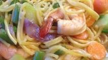 Pancit Canton - Chinese Noodles Stir-fried with Vegetables and Shrimps Pancit Canton - Chinese Noodles Stir-fried with Vegetables and Shrimps