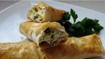 Sigara boregi – crispy cheese and herb filled pastry rolls Sigara boregi – crispy cheese and herb filled pastry rolls