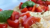 Bruschette con hummus di ceci e pomodorini Bruschette con hummus di ceci e pomodorini