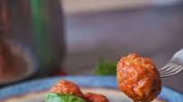 Italian Meatballs cooked in Tomato Sauce Italian Meatballs cooked in Tomato Sauce