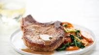 Butter-Basted Pork Chop with roasted carrots and spinach Butter-Basted Pork Chop with roasted carrots and spinach