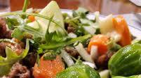 Spiced Beyond Meat Arugula Caesar Salad Served with a Side of Buttery Brussels Sprouts Spiced Beyond Meat Arugula Caesar Salad Served with a Side of Buttery Brussels Sprouts