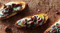 Ricotta Crostini with Spicy Kalamata Olives Ricotta Crostini with Spicy Kalamata Olives