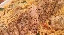 Pork Tenderloin Medallions With Creamy Garlic Spinach Sauce & Pasta Pork Tenderloin Medallions With Creamy Garlic Spinach Sauce & Pasta