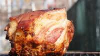 Barbecued pork shoulder on a gas grill Barbecued pork shoulder on a gas grill