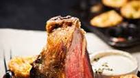 Aged t-bone roast with green peppercorn sauce and Yorkshire puddings Aged t-bone roast with green peppercorn sauce and Yorkshire puddings