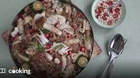 Filipino noodles with squid, pork belly and cabbage (pancit) Filipino noodles with squid, pork belly and cabbage (pancit)