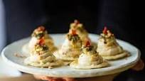 Lemon Sun-Dried Tomato Hummus and Goat Cheese Pesto Bites Lemon Sun-Dried Tomato Hummus and Goat Cheese Pesto Bites