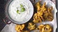 Red onion & chilli bhajis with mint & garlic raita Red onion & chilli bhajis with mint & garlic raita