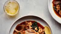 Slow-roasted pork belly with cannellini beans Slow-roasted pork belly with cannellini beans