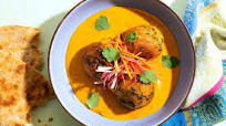 Malai potato kofta dumplings with curry sauce and toasted naan Malai potato kofta dumplings with curry sauce and toasted naan
