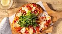 Neapolitan-Style Pizza Margherita with arugula salad Neapolitan-Style Pizza Margherita with arugula salad