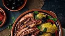 Wine and garlic marinated sous vide octopus on the grill Wine and garlic marinated sous vide octopus on the grill