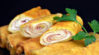 Rollos de pan de molde con jamón y queso Rollos de pan de molde con jamón y queso
