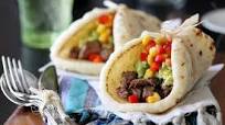 Restaurant Style Carne Asada Soft Tacos with Guacamole and Corn Restaurant Style Carne Asada Soft Tacos with Guacamole and Corn