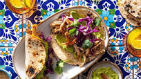 Pork carnitas tacos with mojo and guacamole Pork carnitas tacos with mojo and guacamole