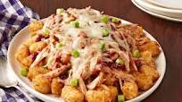 Cubitos de papas y pavo en salsa BBQ de arándanos Cubitos de papas y pavo en salsa BBQ de arándanos