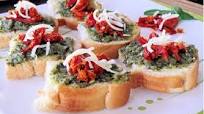 bruschetta with pesto and sundried tomato bruschetta with pesto and sundried tomato