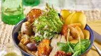 Mediterranean antipasto bowl with spicy citrus dressing Mediterranean antipasto bowl with spicy citrus dressing