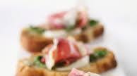 Bruschetta with Basil, Prosciutto and Mozzarella Bruschetta with Basil, Prosciutto and Mozzarella
