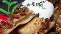 Pierogies With Bacon, Sauteed Onion and Sour Cream Pierogies With Bacon, Sauteed Onion and Sour Cream