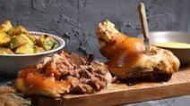 Roast pork shank with potatoes Roast pork shank with potatoes