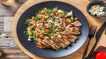 Mediterranean Grilled Pork Chops with Veggie Couscous and Feta Mediterranean Grilled Pork Chops with Veggie Couscous and Feta