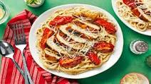 Chicken Over Garlic Parmesan Spaghetti with Tuscan Roasted Tomatoes Chicken Over Garlic Parmesan Spaghetti with Tuscan Roasted Tomatoes