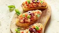Bruschetta mit Tomate und Mozzarella Bruschetta mit Tomate und Mozzarella