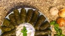 Armenian Dolma (Tolma) Served With Yoghurt-Mint Sauce. Armenian Dolma (Tolma) Served With Yoghurt-Mint Sauce.