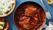 Latin-Style Smothered Pork Chops with Cilantro-Garlic Rice Latin-Style Smothered Pork Chops with Cilantro-Garlic Rice