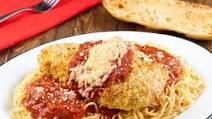 Classic Chicken Parmesan with spaghetti and garlic bread Classic Chicken Parmesan with spaghetti and garlic bread