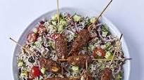 Spicy lamb & feta skewers with Greek brown rice salad Spicy lamb & feta skewers with Greek brown rice salad