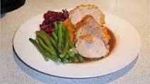 Crumbed pork fillet, red cabbage and apple braise, kumara mash and pinot jus Crumbed pork fillet, red cabbage and apple braise, kumara mash and pinot jus
