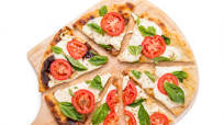 Bobby Flay’s Margherita grilled pizza Bobby Flay’s Margherita grilled pizza