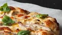 White Pizza with Alfredo, Pesto Herb Oil, and Veggies White Pizza with Alfredo, Pesto Herb Oil, and Veggies