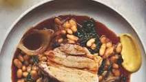 Slow-roasted pork belly with cannellini beans Slow-roasted pork belly with cannellini beans