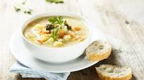Creamy cauliflower soup with potatoes, carrots and broccoli Creamy cauliflower soup with potatoes, carrots and broccoli