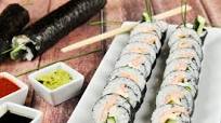 Shrimp Maki Sushi Roll With Wasabi, Soy Sauce, and Sriracha Shrimp Maki Sushi Roll With Wasabi, Soy Sauce, and Sriracha