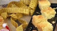 Eggless Semolina and Coconut Cake recipe - How to make Eggless Semolina and Coconut Cake Eggless Semolina and Coconut Cake recipe - How to make Eggless Semolina and Coconut Cake