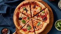Margherita Pizza with Tomato, Mozzarella and Basil Margherita Pizza with Tomato, Mozzarella and Basil