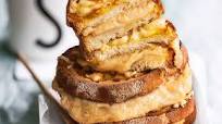 'Welsh rarebit' (tostada con queso, mostaza y cerveza) 'Welsh rarebit' (tostada con queso, mostaza y cerveza)