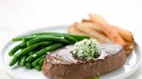 Brasserie-Style Sirloin Steak with truffle frites and herb butter Brasserie-Style Sirloin Steak with truffle frites and herb butter