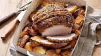 Pork leg roast with roasted shallots and potatoes Pork leg roast with roasted shallots and potatoes